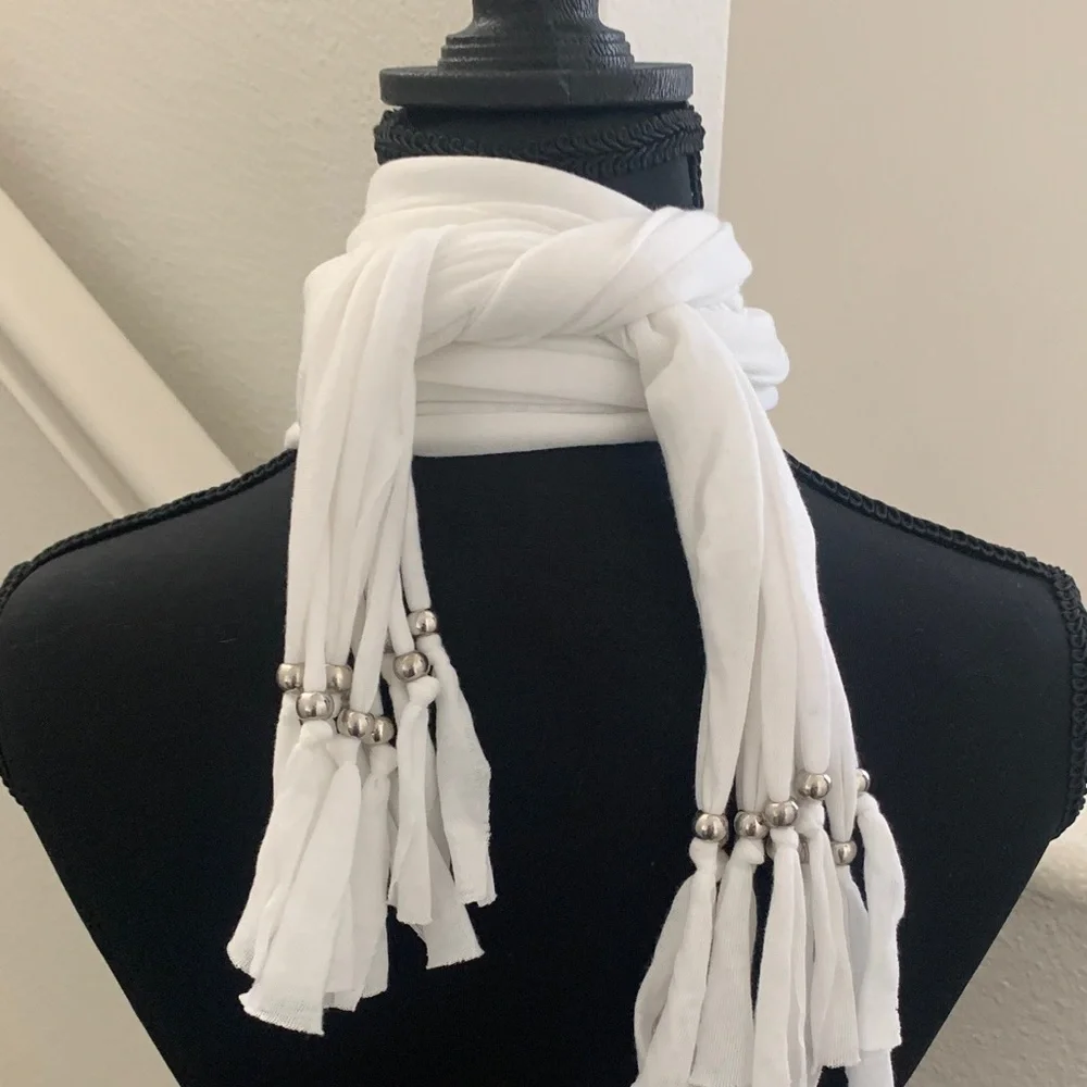 NWOT Chic White Scarf Necklace with Fleur-de-Lis Pendant.